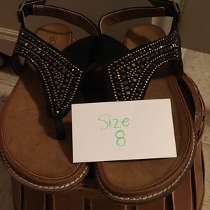 Black and gold sandals